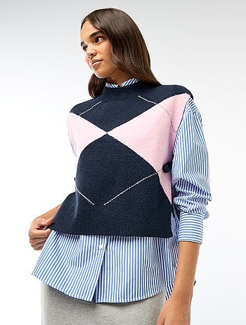 Maglione smanicato con lacci da annodare sui lati