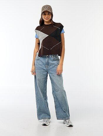 Maglione smanicato con lacci da annodare sui lati