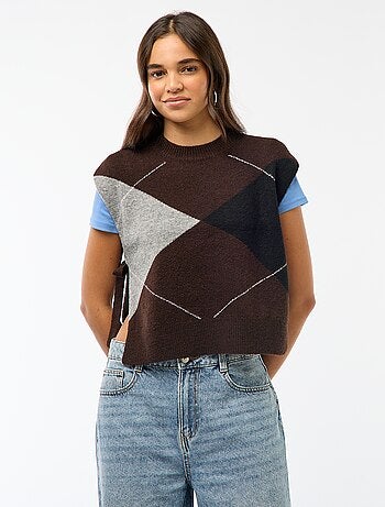 Maglione smanicato con lacci da annodare sui lati