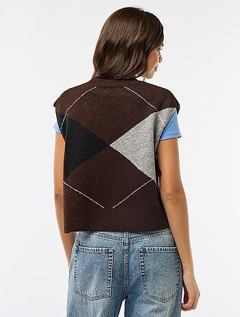 Maglione smanicato con lacci da annodare sui lati