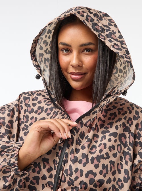 Mantella antipioggia idrorepellente con cappuccio - Kiabi Mantella antipioggia idrorepellente con cappuccio - Kiabi