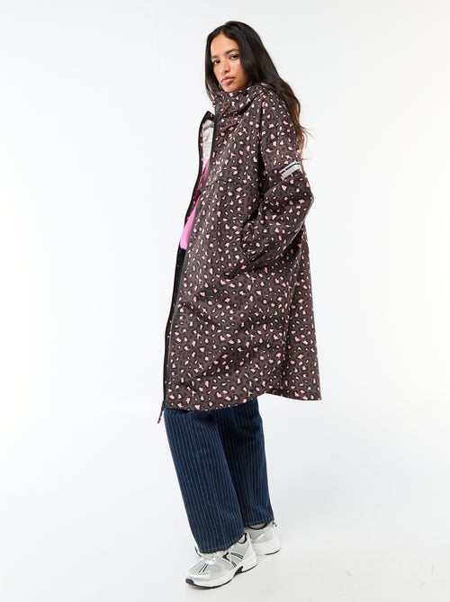 Mantella antipioggia idrorepellente con cappuccio e sistema di ripiegamento su sé stessa - Kiabi