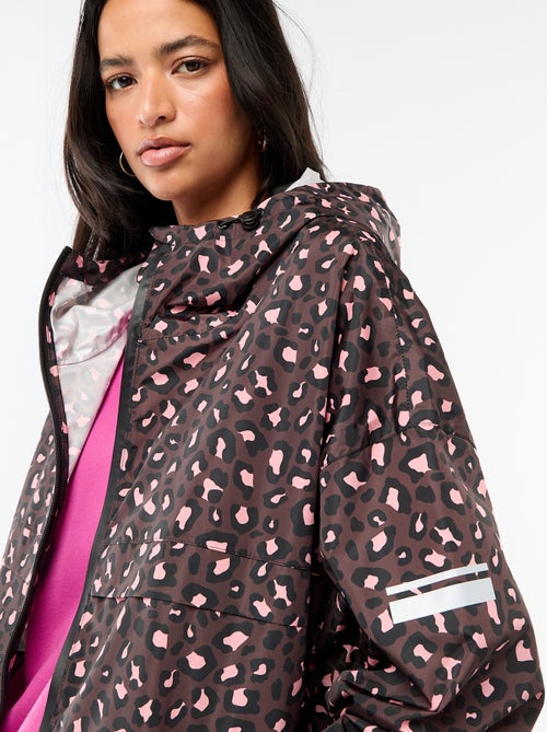 Mantella antipioggia idrorepellente con cappuccio e sistema di ripiegamento su sé stessa - Kiabi