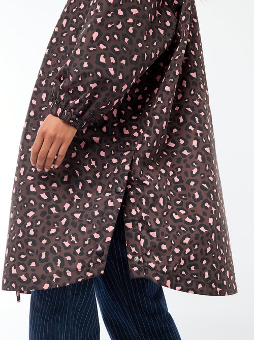 Mantella antipioggia idrorepellente con cappuccio e sistema di ripiegamento su sé stessa - Kiabi