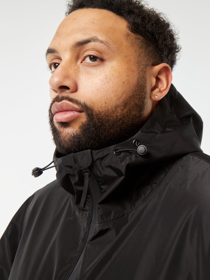 Mantella antipioggia lunga con cappuccio nero - Kiabi