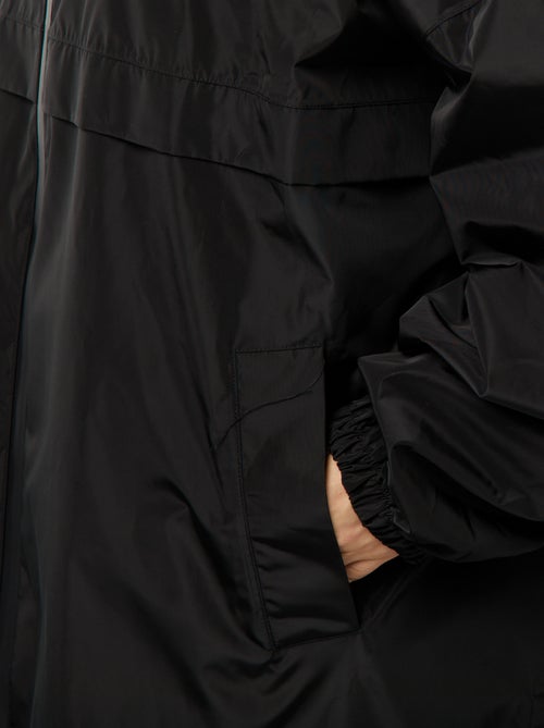 Mantella antipioggia lunga con cappuccio - Kiabi