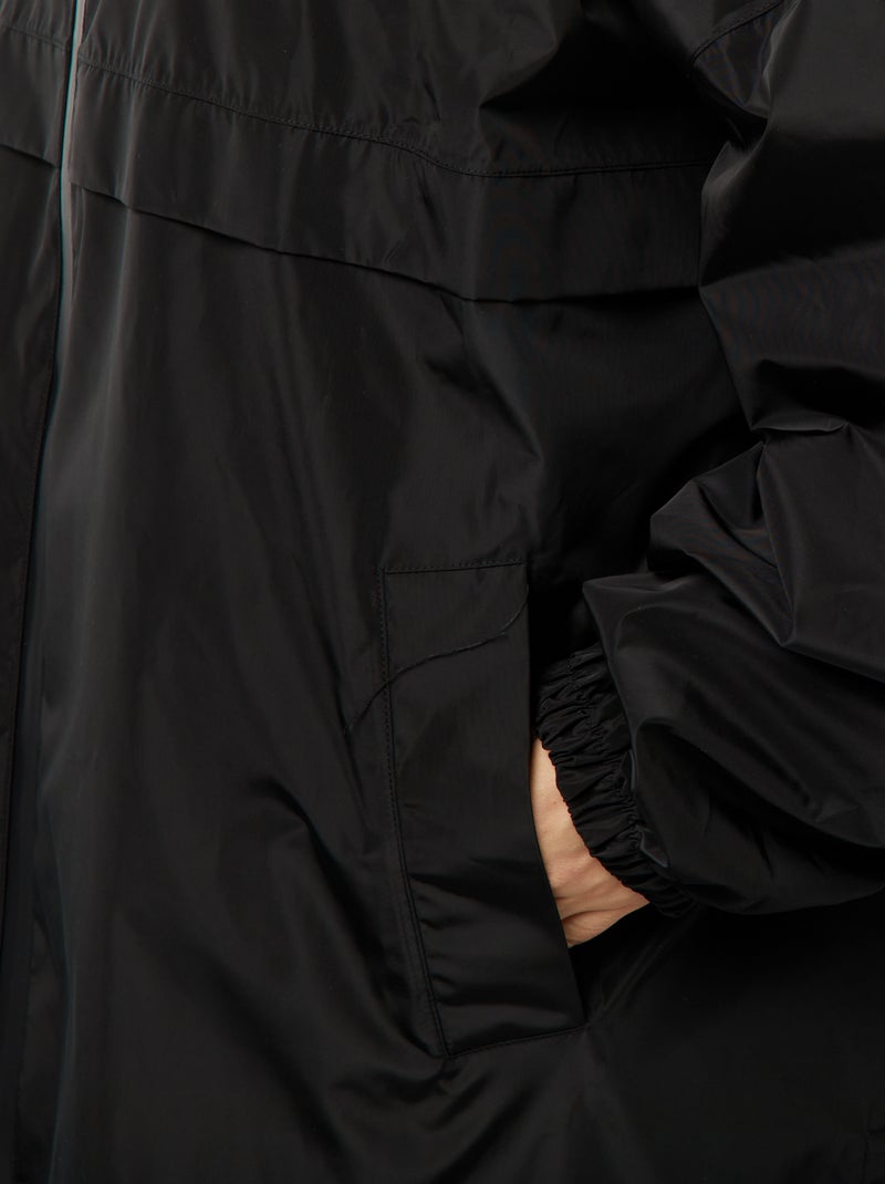 Mantella antipioggia lunga con cappuccio nero - Kiabi