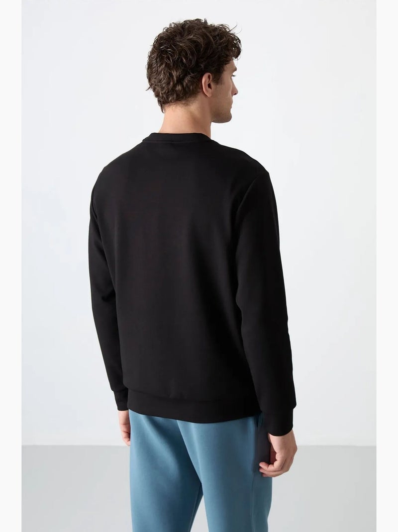 Men's felpa tinta unita con girocollo tommy Nero - Kiabi