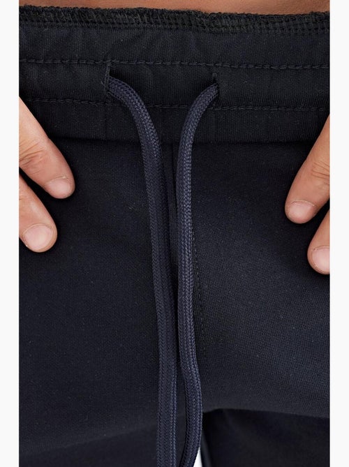 Men's pantaloncini felpati in maglia tinta unita tommy - Kiabi