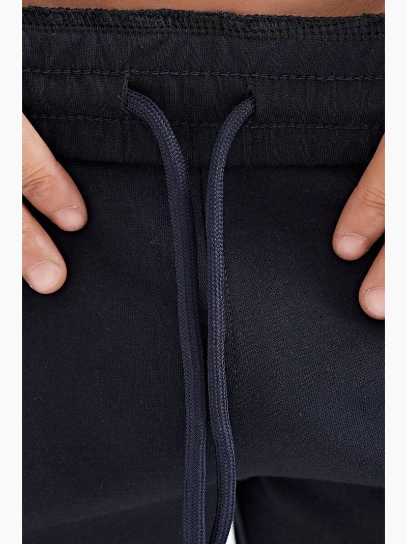 Men's pantaloncini felpati in maglia tinta unita tommy Blu laguna - Kiabi