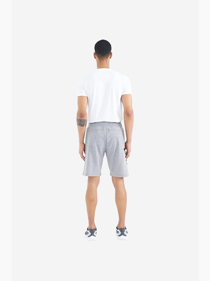 Men's pantaloncini felpati in misto cotone tommy Grigio - Kiabi
