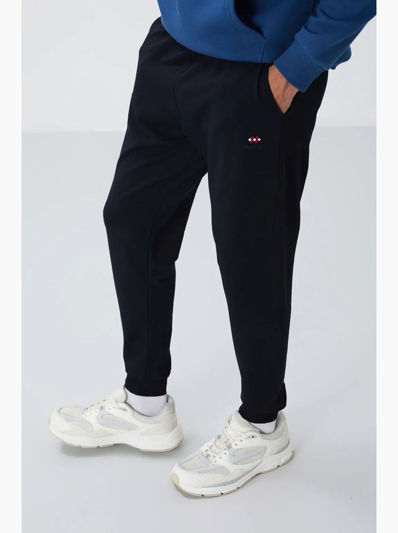 Men's pantaloni della tuta in pile tinta unita tommy Blu laguna - Kiabi