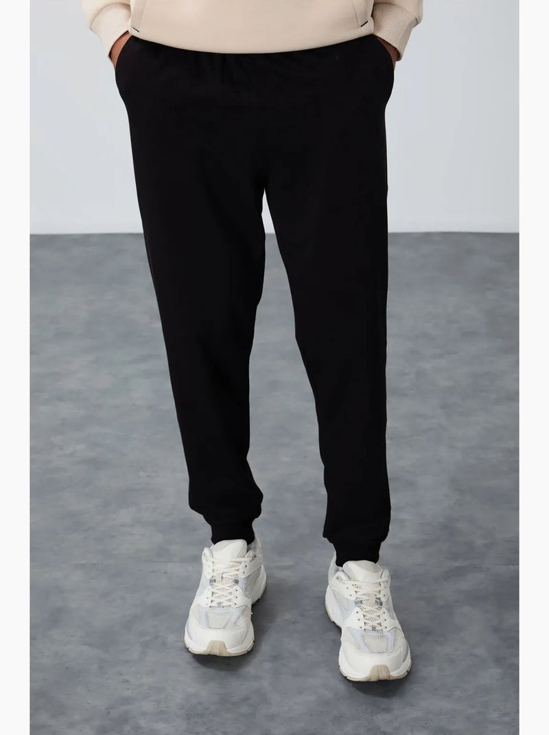 Men's pantaloni della tuta in pile tinta unita tommy Nero - Kiabi
