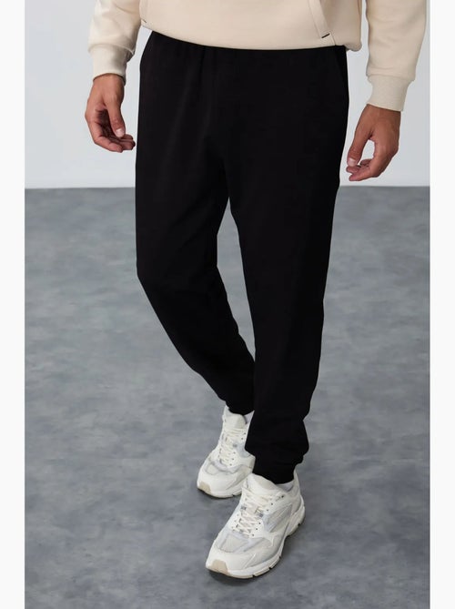 Men's pantaloni della tuta in pile tinta unita tommy - Kiabi Men's pantaloni della tuta in pile tinta unita tommy - Kiabi