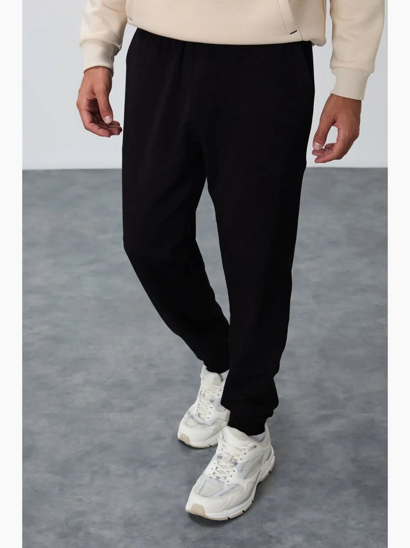Men's pantaloni della tuta in pile tinta unita tommy Nero - Kiabi