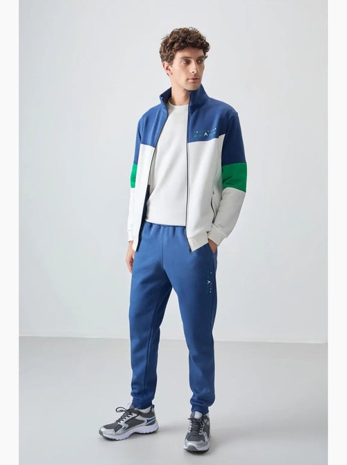 Men's set di felpa con zip e pantaloni color block tommy - Kiabi Men's set di felpa con zip e pantaloni color block tommy - Kiabi