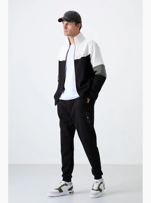 Men's set di felpa con zip e pantaloni color block tommy - Kiabi Men's set di felpa con zip e pantaloni color block tommy - Kiabi