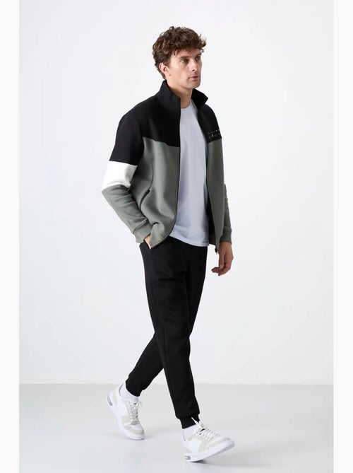 Men's set di felpa con zip e pantaloni color block tommy - Kiabi Men's set di felpa con zip e pantaloni color block tommy - Kiabi