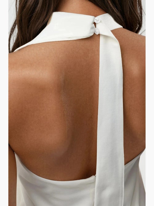 Mini abito con collo halter e schiena scoperta hiccup - Kiabi Mini abito con collo halter e schiena scoperta hiccup - Kiabi
