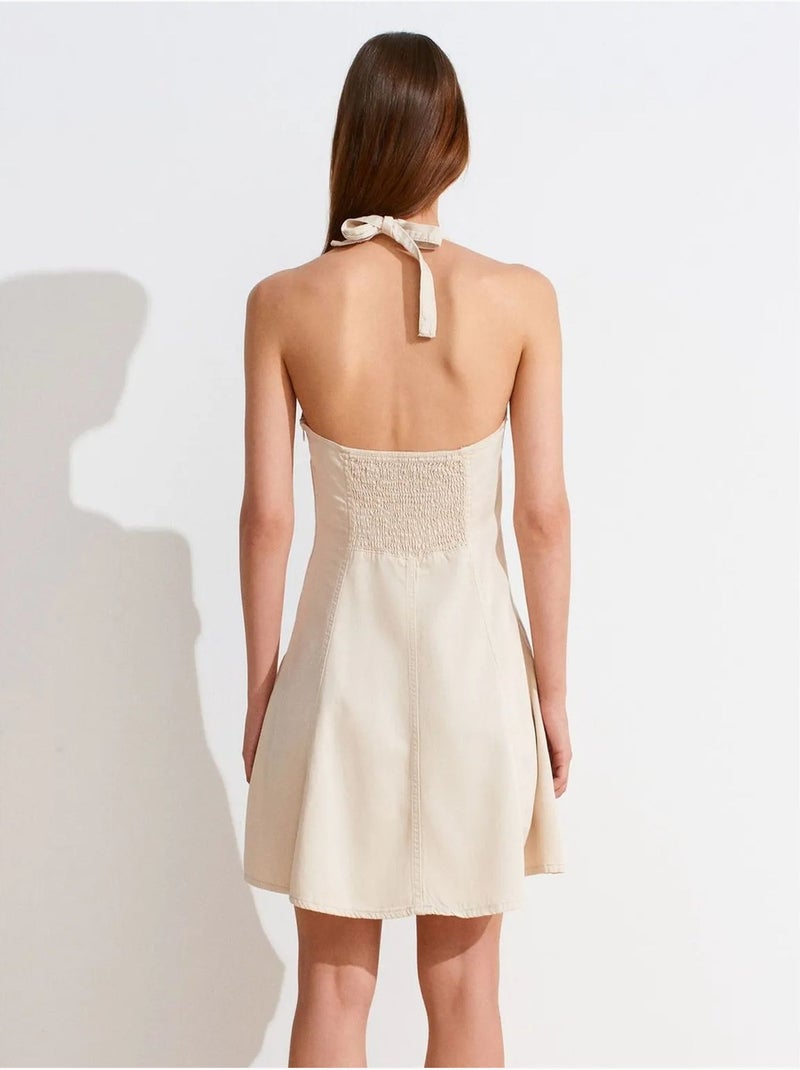 Mini abito svasato a trapezio con scollo all'americana dilvin Beige naturale - Kiabi