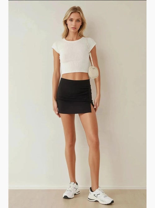 Mini skort con dettaglio drappeggiato hiccup - Kiabi Mini skort con dettaglio drappeggiato hiccup - Kiabi