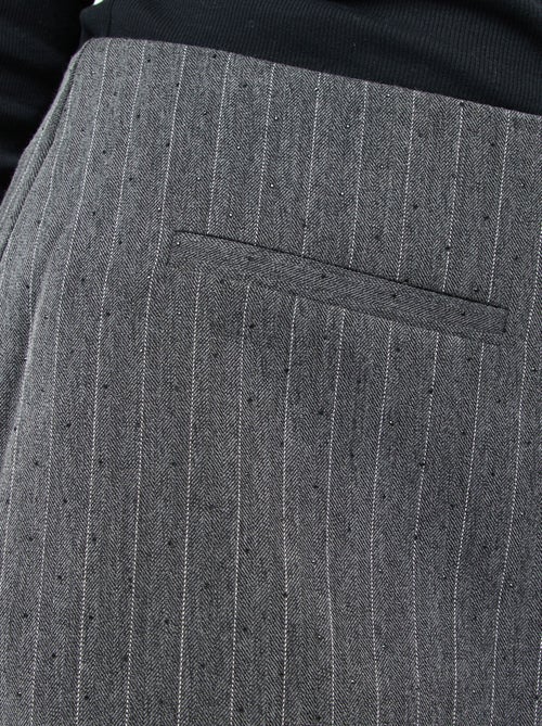 Minigonna pantaloncino a righe e strass all over - Kiabi