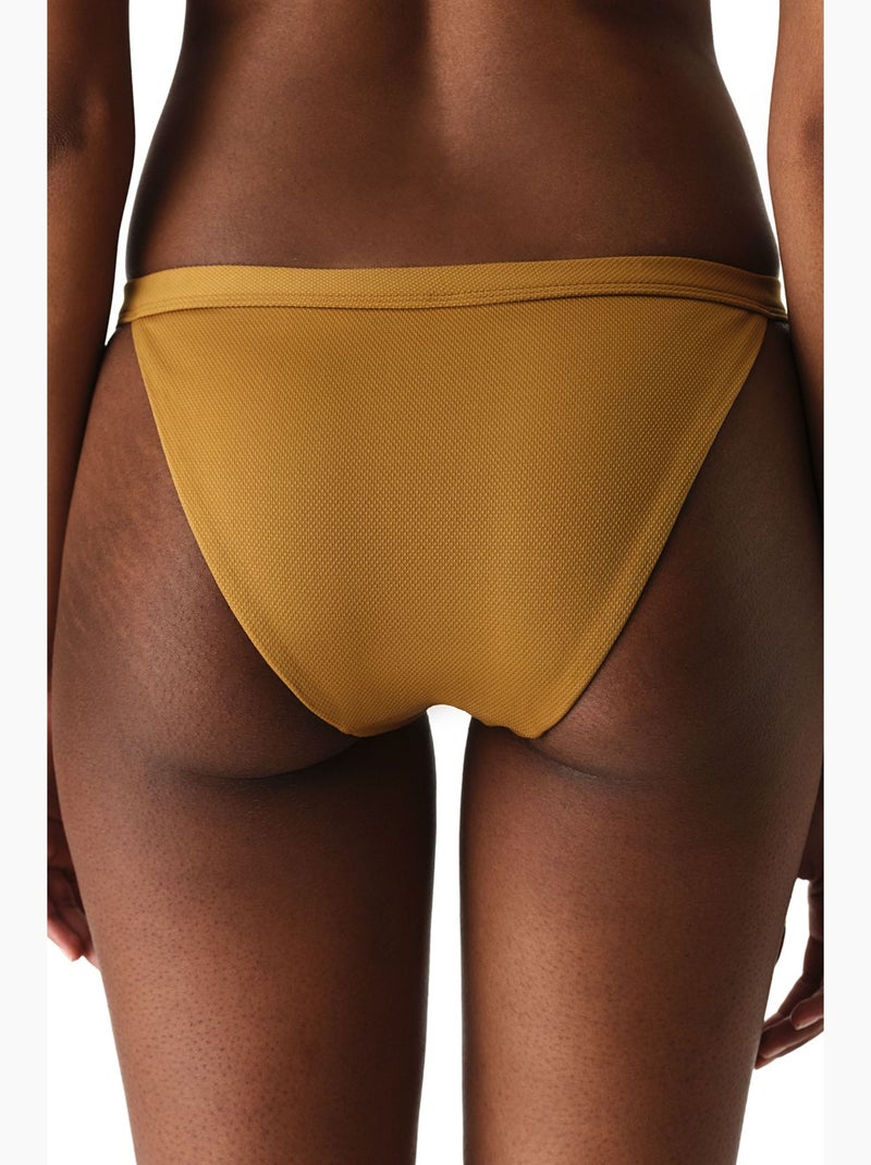 Montana slip bikini con texture laterale e vita media penti Ambra - Kiabi