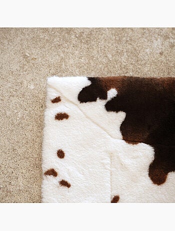 Morbido plaid con motivo a pelle di mucca e retro in velluto