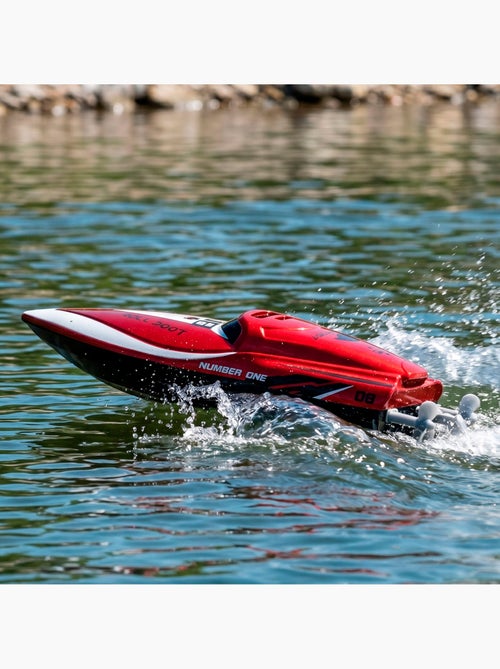 Motoscafo radiocomandato rosso + 4 anni di speed&go - Kiabi Motoscafo radiocomandato rosso + 4 anni di speed&go - Kiabi