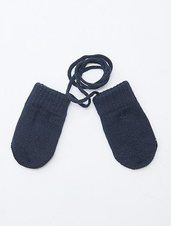 Muffole in pile lavorate a maglia