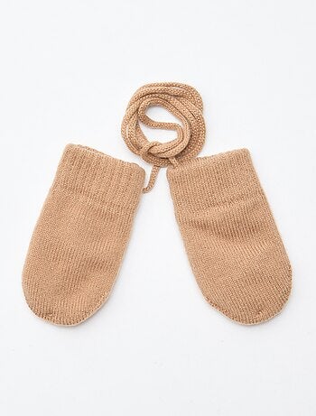 Muffole in pile lavorate a maglia