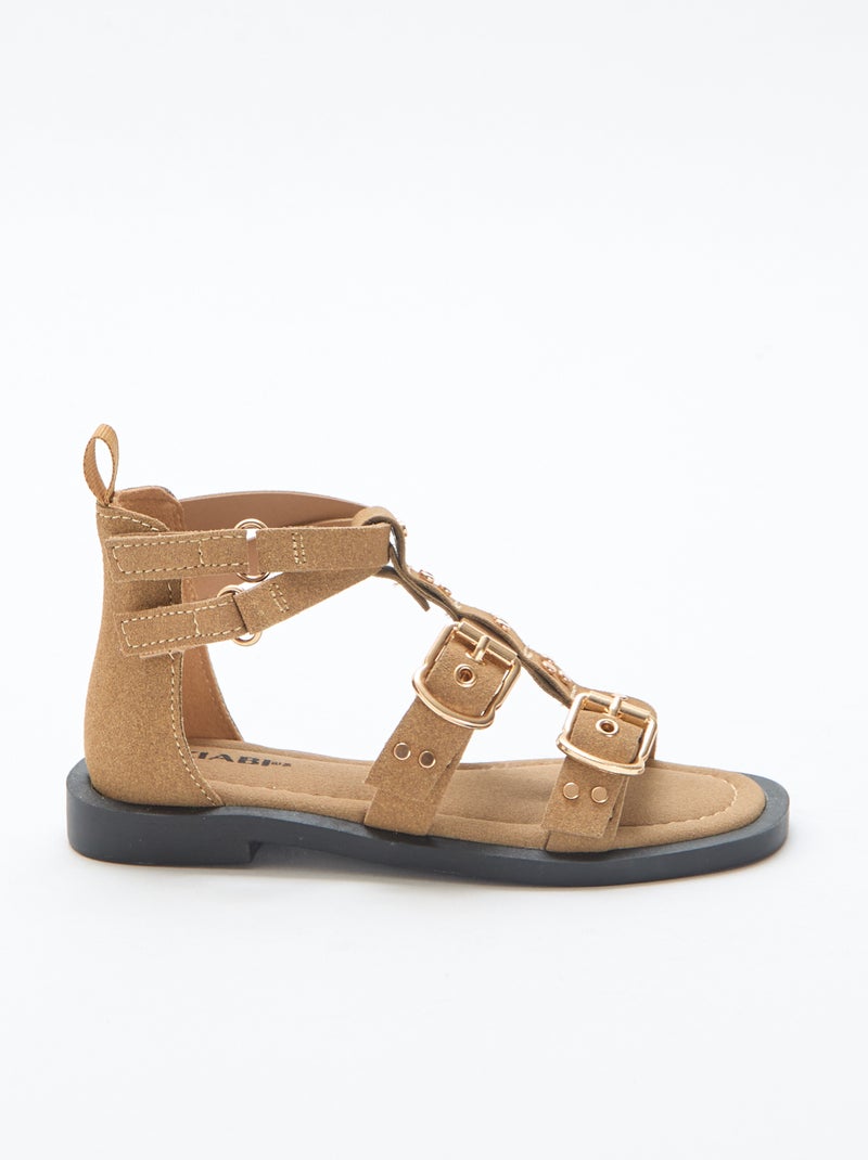 Paio di sandali bassi con listini borchiati Beige - Kiabi