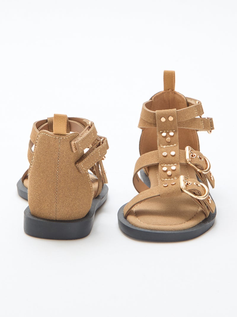 Paio di sandali bassi con listini borchiati Beige - Kiabi
