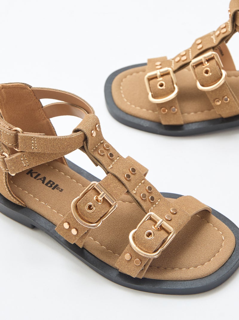 Paio di sandali bassi con listini borchiati Beige - Kiabi