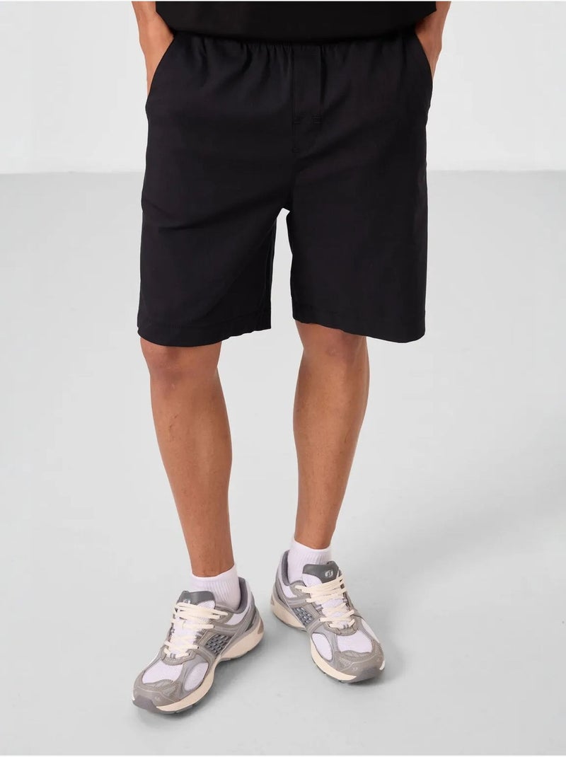 Pantaloncini chino da uomo regular fit tommy Nero - Kiabi