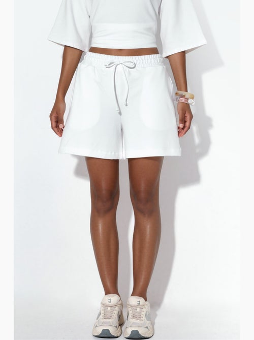 Pantaloncini felpati con coulisse a vita media busem - Kiabi Pantaloncini felpati con coulisse a vita media busem - Kiabi