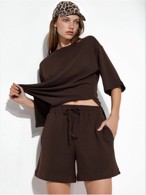 Pantaloncini felpati con coulisse a vita media busem - Kiabi Pantaloncini felpati con coulisse a vita media busem - Kiabi