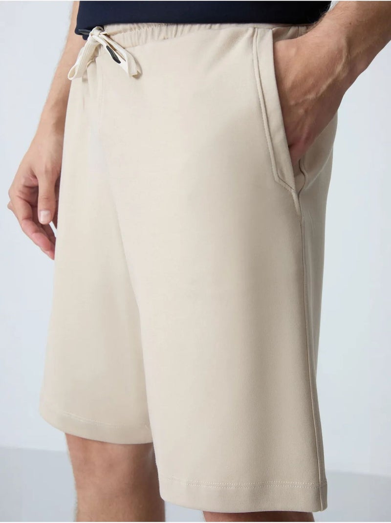 Pantaloncini felpati da uomo in misto cotone tommy Beige argilla - Kiabi