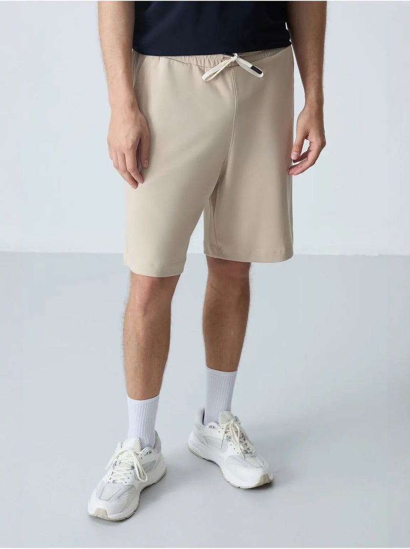 Pantaloncini felpati da uomo in misto cotone tommy Beige argilla - Kiabi