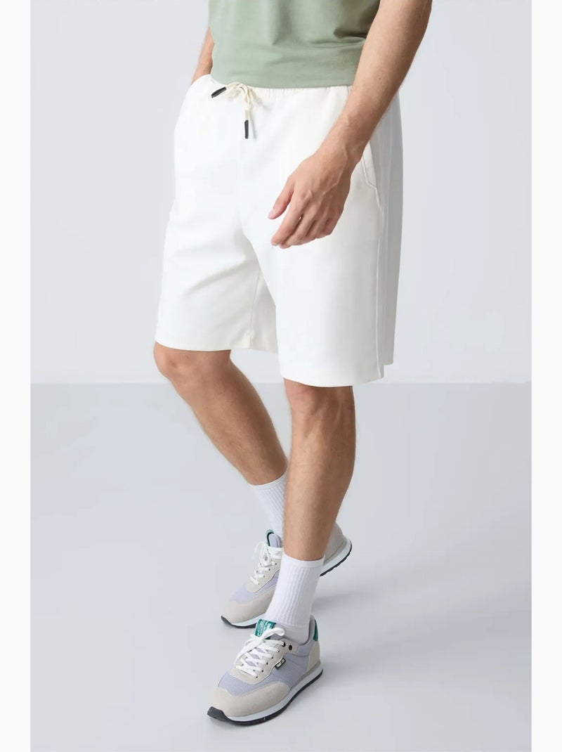 Pantaloncini felpati da uomo in misto cotone tommy Bianco - Kiabi