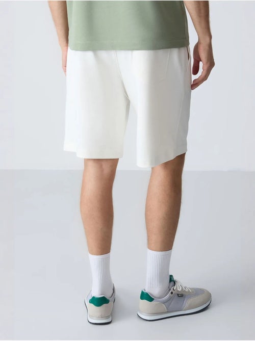 Pantaloncini felpati da uomo in misto cotone tommy - Kiabi Pantaloncini felpati da uomo in misto cotone tommy - Kiabi