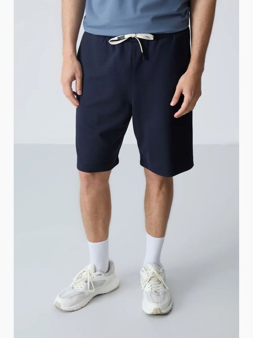 Pantaloncini felpati da uomo in misto cotone tommy - Kiabi Pantaloncini felpati da uomo in misto cotone tommy - Kiabi