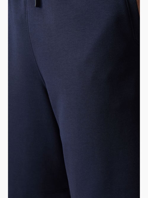 Pantaloncini felpati da uomo in misto cotone tommy - Kiabi Pantaloncini felpati da uomo in misto cotone tommy - Kiabi