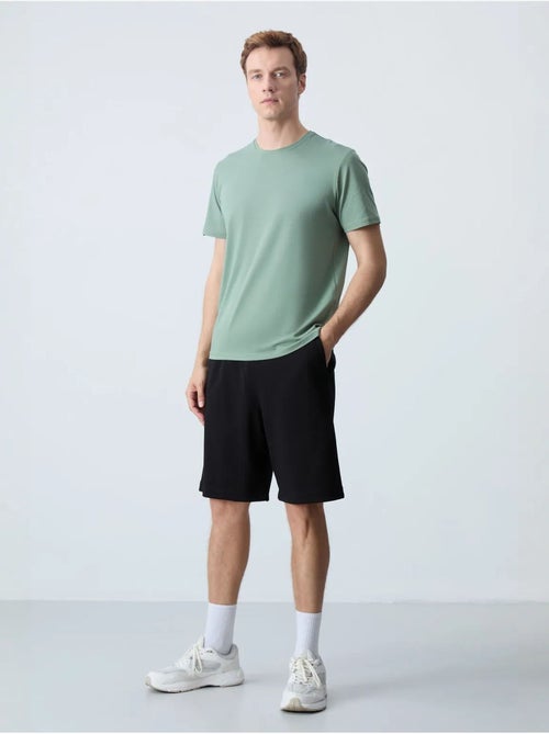 Pantaloncini felpati da uomo in misto cotone tommy - Kiabi Pantaloncini felpati da uomo in misto cotone tommy - Kiabi