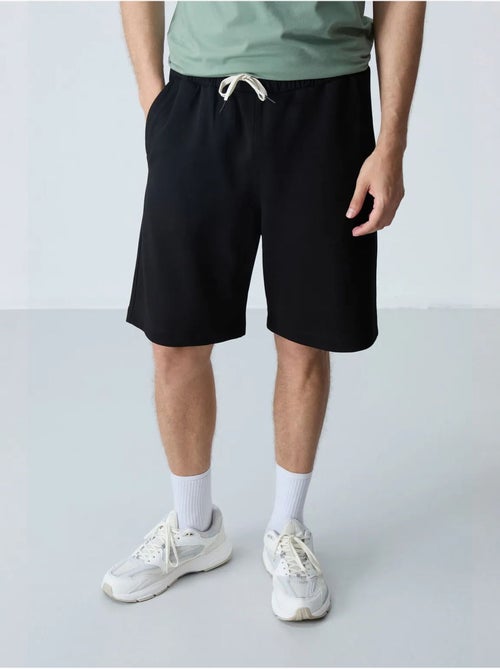 Pantaloncini felpati da uomo in misto cotone tommy - Kiabi Pantaloncini felpati da uomo in misto cotone tommy - Kiabi