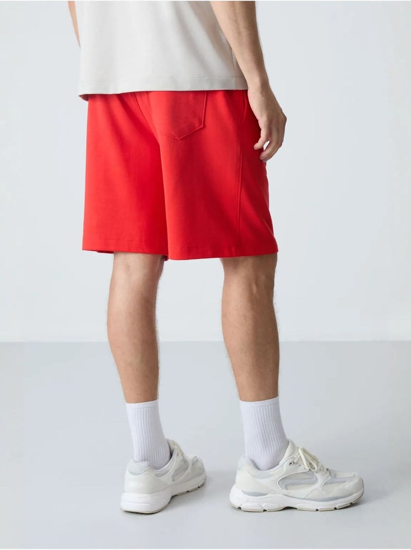 Pantaloncini felpati da uomo in misto cotone tommy Rosso - Kiabi