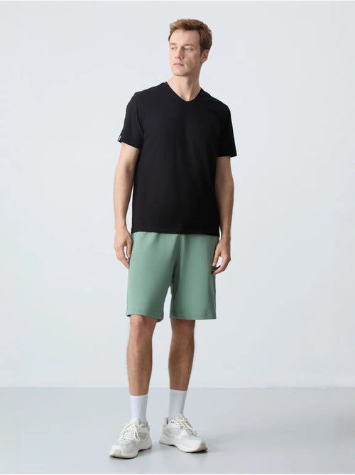 Pantaloncini felpati da uomo in misto cotone tommy - Kiabi Pantaloncini felpati da uomo in misto cotone tommy - Kiabi