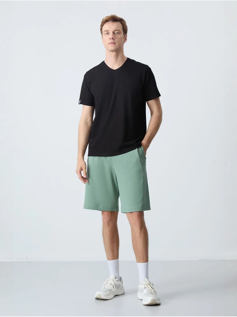 Pantaloncini felpati da uomo in misto cotone tommy Verde menta - Kiabi