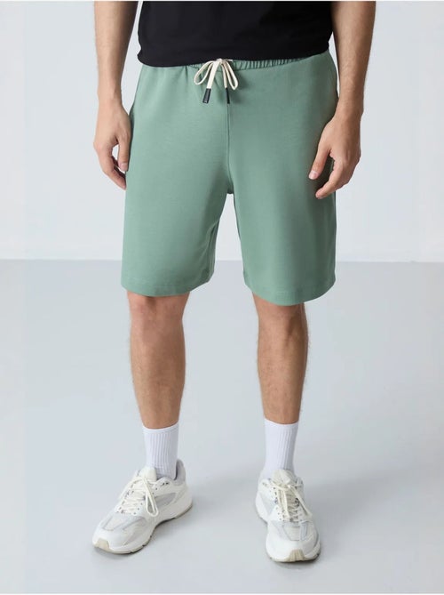 Pantaloncini felpati da uomo in misto cotone tommy - Kiabi Pantaloncini felpati da uomo in misto cotone tommy - Kiabi