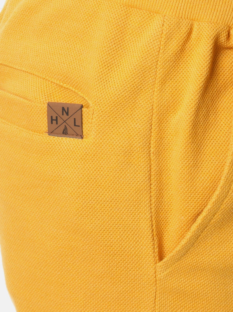 Pantaloncini in maglia piqué Giallo senape - Kiabi